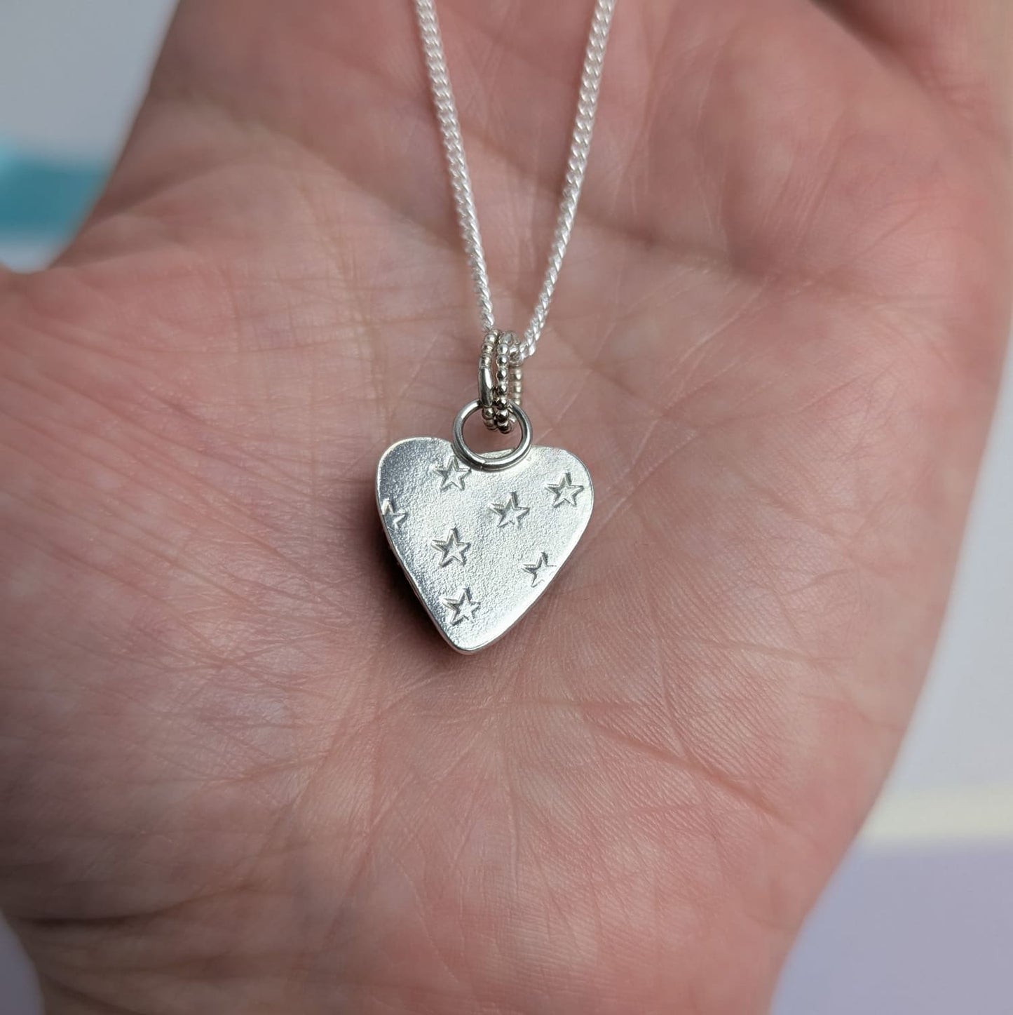 Surfite Heart Pendant with Star Detail. Recycled Sterling Silver