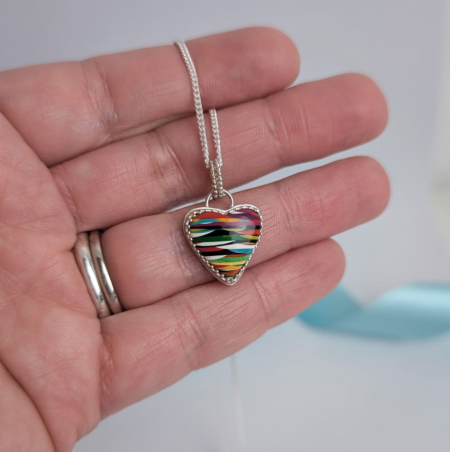 Surfite Heart Pendant with Star Detail. Recycled Sterling Silver