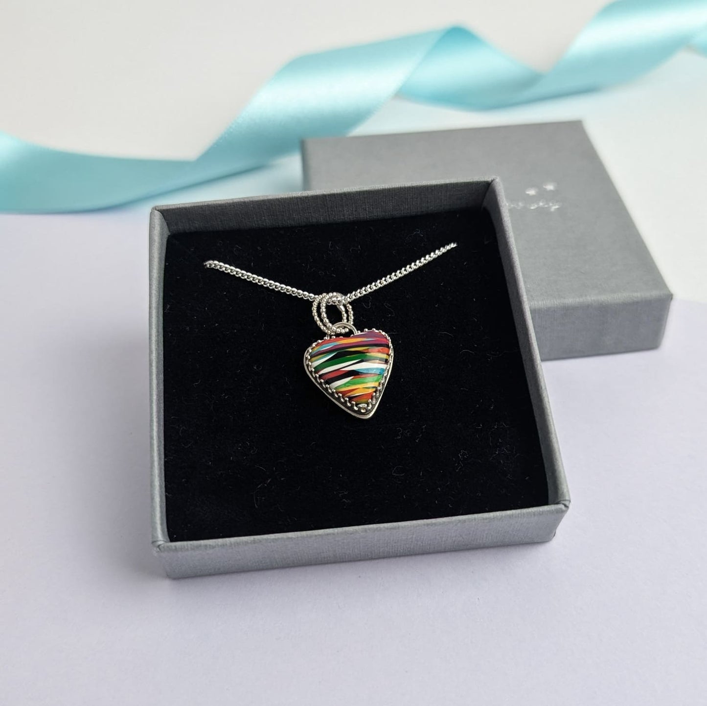 Surfite Heart Pendant with Star Detail. Recycled Sterling Silver